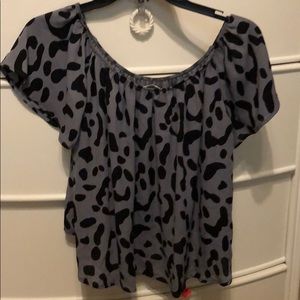 Over the shoulder cheetah print short sleeve shirt